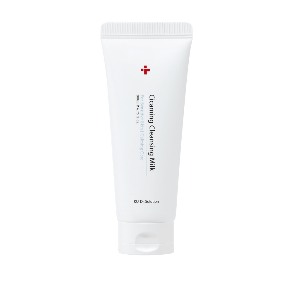 Tube of cleansing milk with a red cross logo on a white background