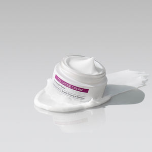 front view of clean-up collagen cream open jar on white background.