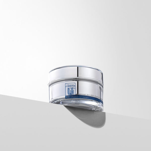 bottom up view of cu vitamin u cream moisturizer sitting on an edge
