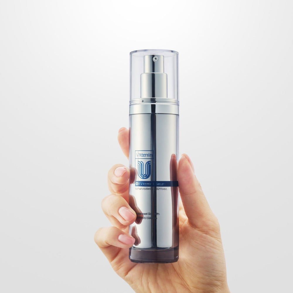 Skincare serum bottle with a clear label on a white background