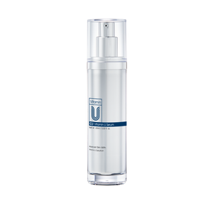 Skincare serum bottle with 'Vitamin U' branding on a white background