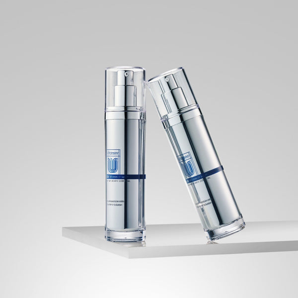two cu vitamin u serum leaning against each other on ledge side view