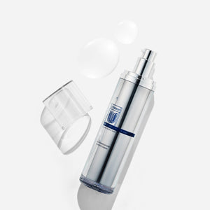 cu vitamin u toner Skincare product with pump on a white background.