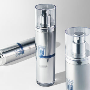 front view of three cu vitamin u toner on grey background.